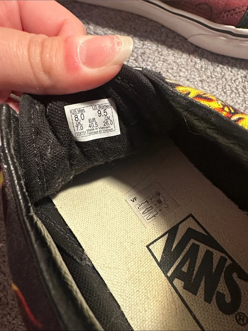 Vans Black Low-Top Sneakers with Yellow and Orange Flame Detail